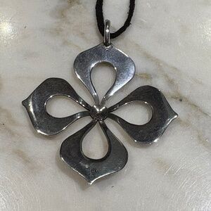 James Avery Retired Sterling Silver Hammered Flower Pendant